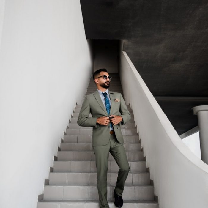 man-in-grey-suit-standing-on-stair-1321943.jpg